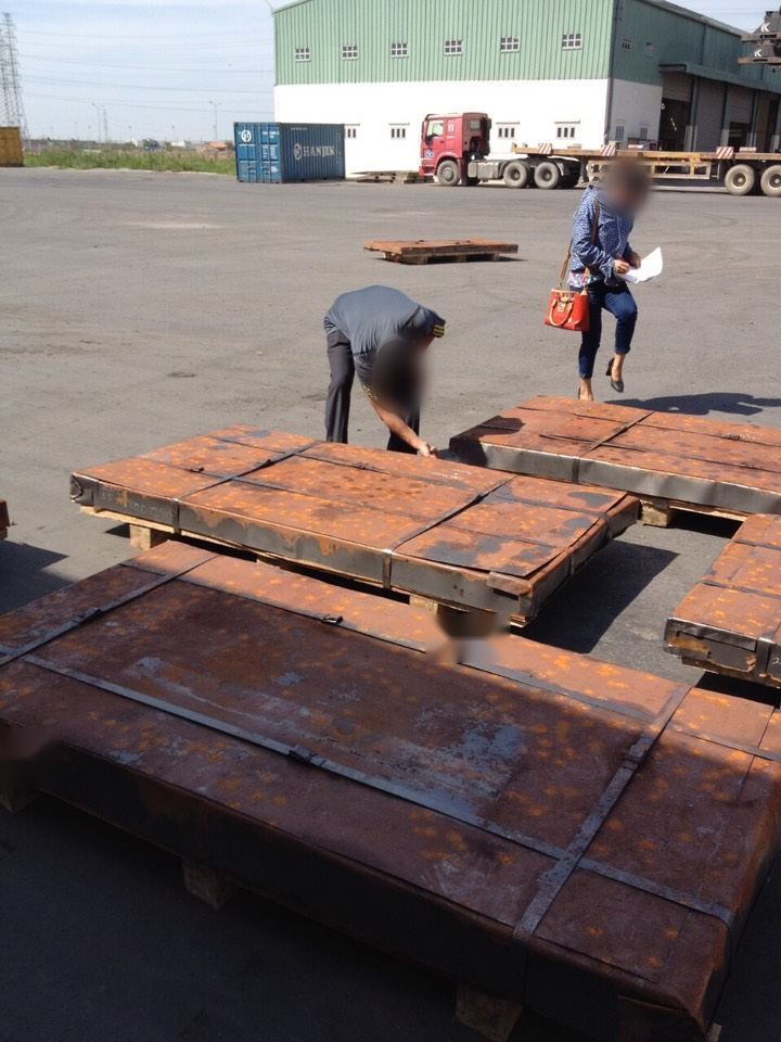 Inspecting steel plates on arrival